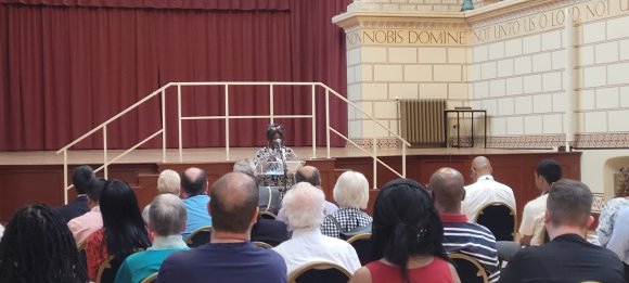 Janet Cole of Northampton Windrush Generation and Descendants UK reads a poem written by Doreen McKenzie